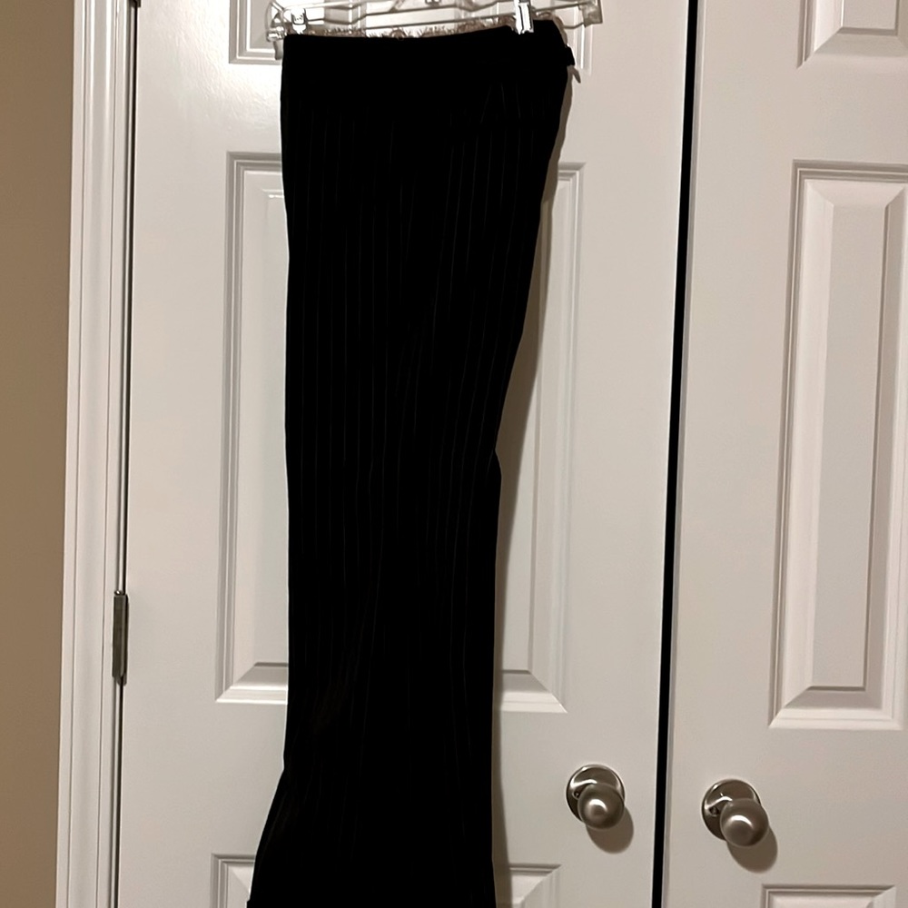 Black pinstriped trousers